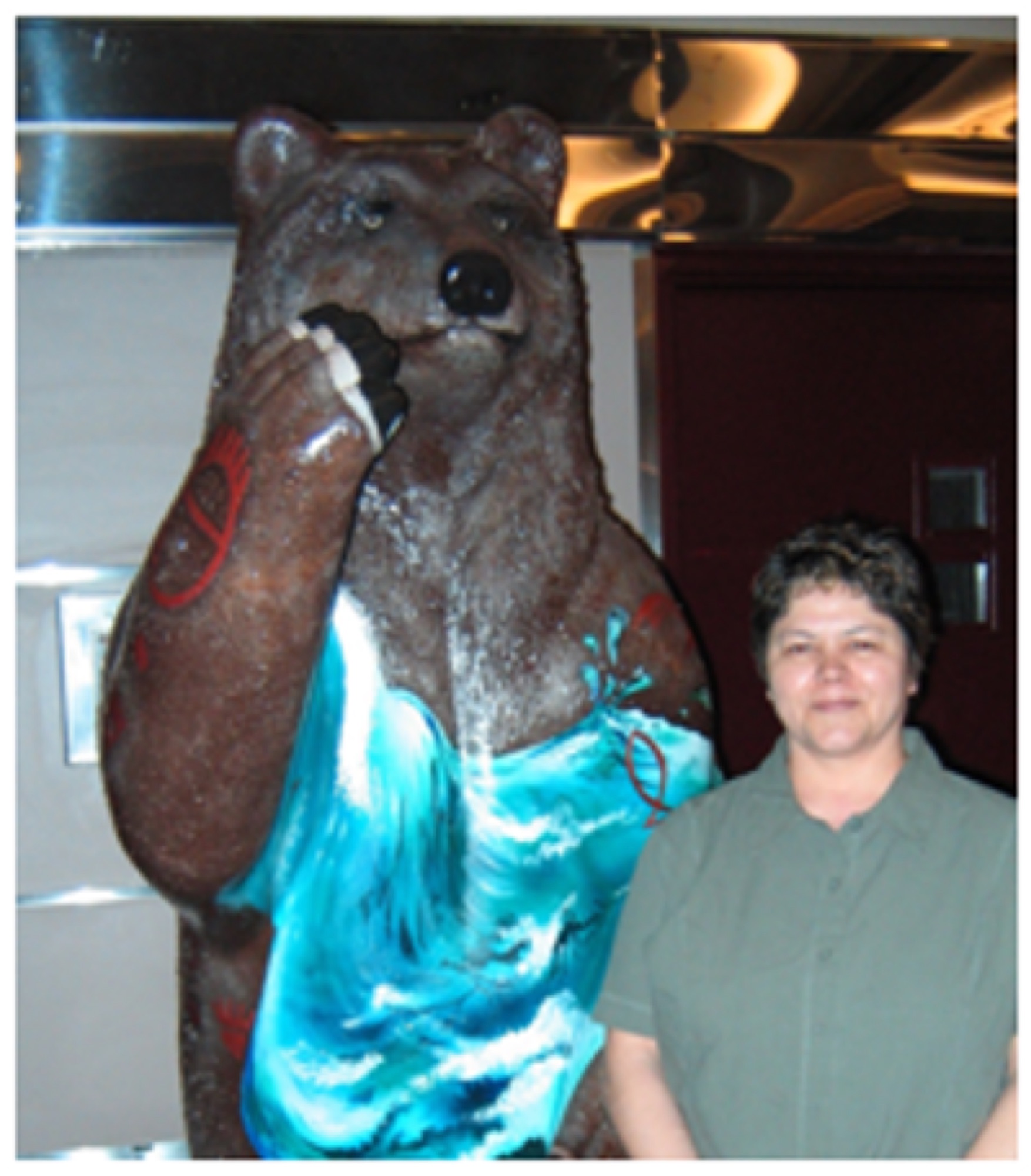 Rosalie Dipcsu Williams standing beside the finished bear