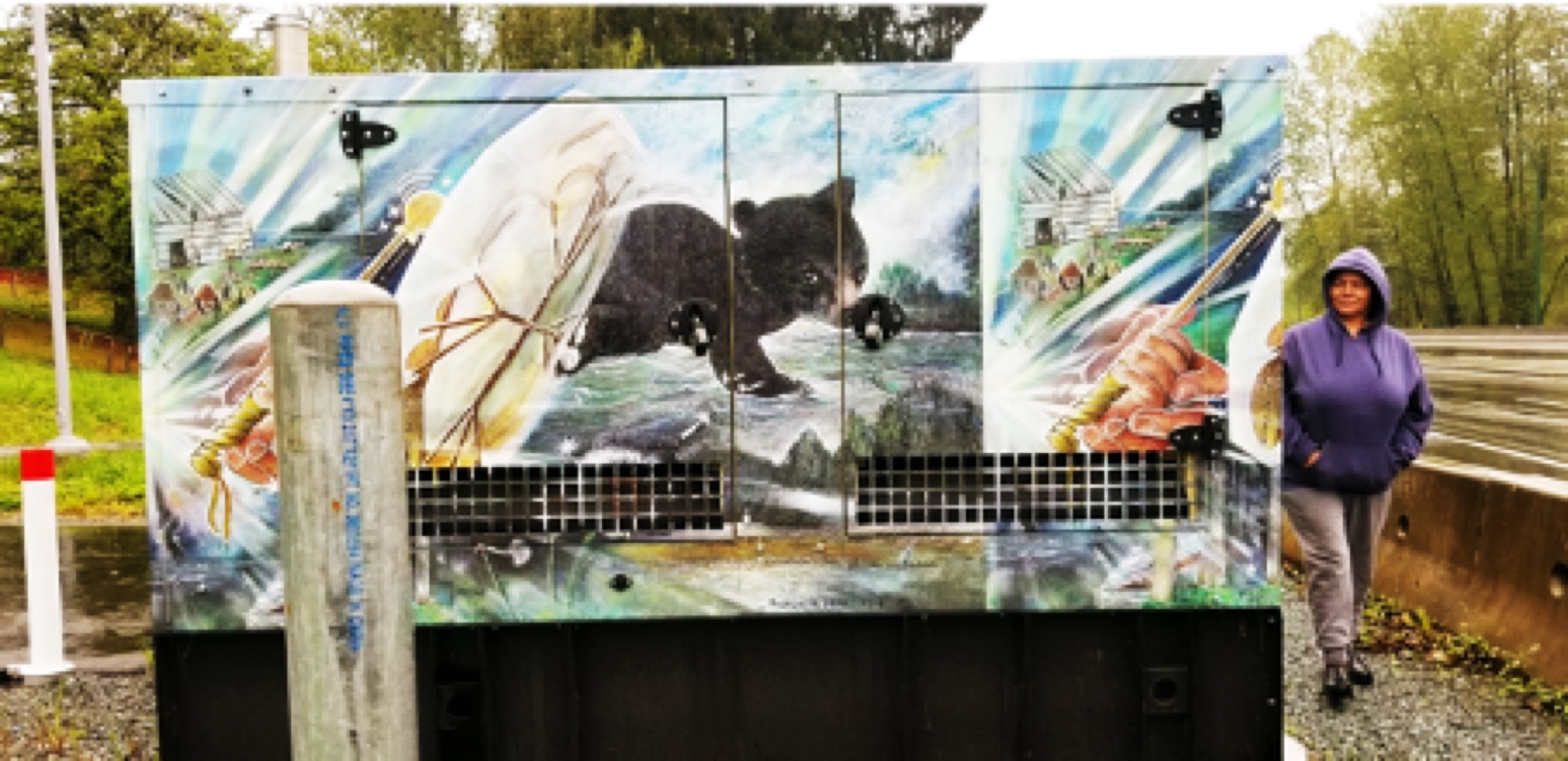 Rosalie beside the finished box on Lougheed Highway