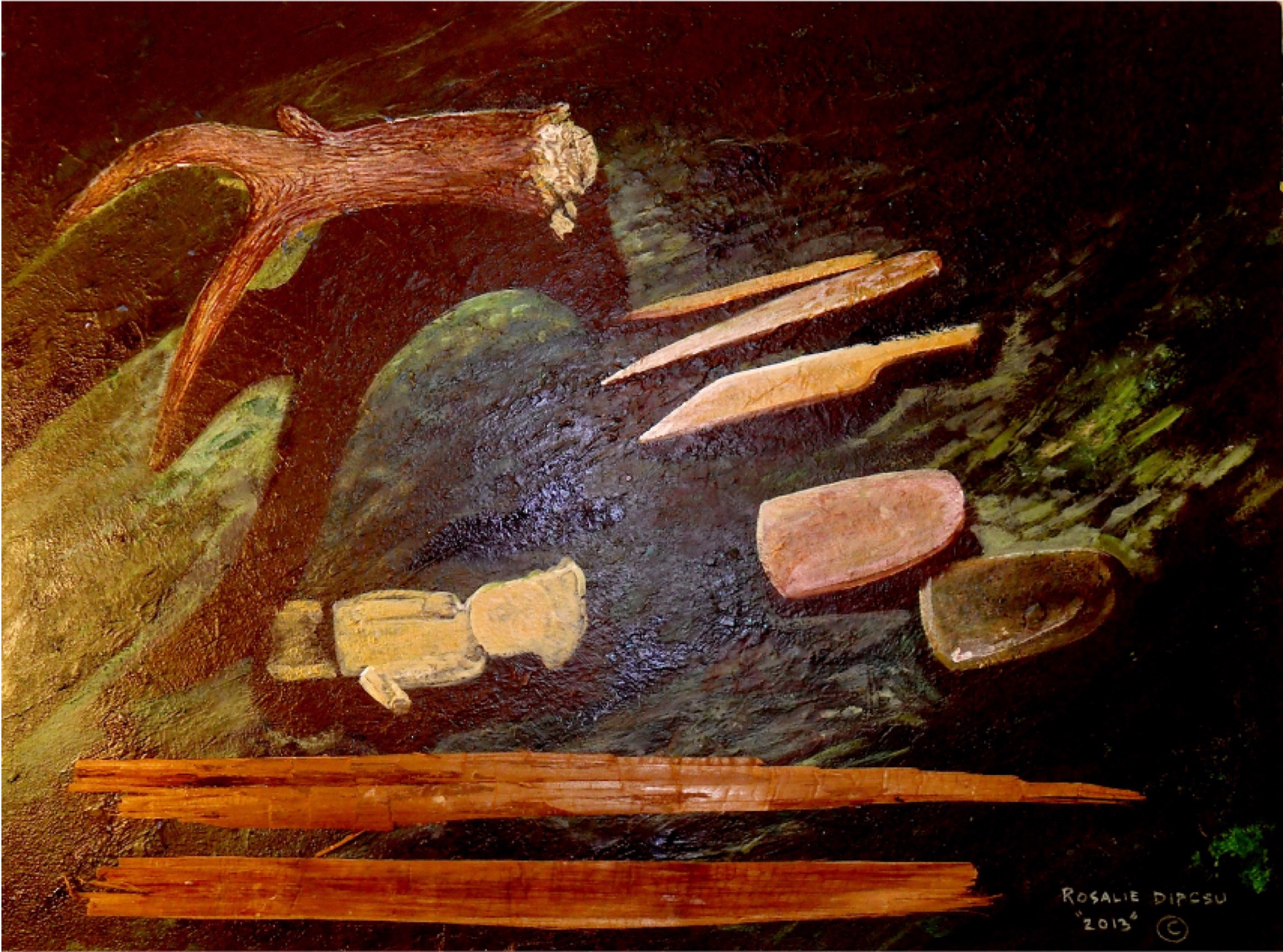 Antler, knives, cedar strips and a small carved figure on a dark ground